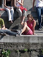Upskirt pictures - Busty chick voyeured in public. Up skirt sitting