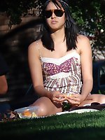 Upskirt pictures - Hot brunette on a glade. Young girl upskirt