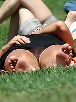 12 pictures - Hot girl up skirt. She wears pink dotted panties