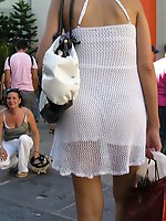 Upskirt pictures - Panty upskirt - brunette in white dress voyeured