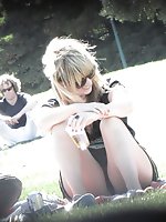 12 pictures - Blondie in black. Hidden camera up skirt