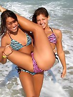 Upskirt pictures - A girl stripping out of her bikini on the Rarawa Nudist