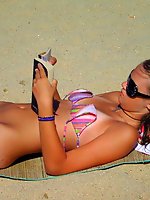 Upskirt pictures - Topless women on the Koh PhanganA babe on open swim suit at the Bakers