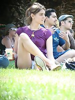 Upskirt pictures - Squat upskirt. Crazy smiling chick caught by hidden cam