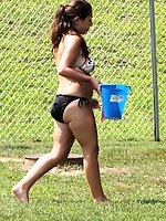 Upskirt pictures - Girl playing her bikini thong