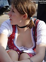 Upskirt pictures - Tight corset squeezes big tits and uncovers downblouse
