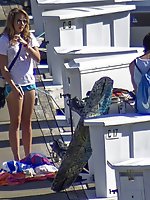 12 pictures - Voyeured girls in swimsuits on beach