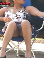 Upskirt pictures - This chocolate babe is very hot. Up the skirt