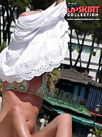 Upskirt pictures - Bikini  voyeur hunter works on beach