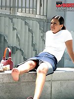 12 pictures - Young brunette caught sitting. Candid upskirt