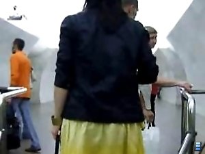 4 movies - Chick in a yellow skirt saw me, but I managed to see her treasure. I couldn\'t see the colour of duds