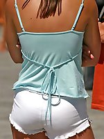 27 pictures - Cute blonde gets spied wearing fishnets and shorts