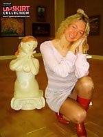 24 pictures - Fishnet tights and black panty up the skirt