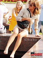 12 pictures - Sexy street upskirt in a park