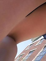 12 pictures - Pretty brunette in blue skirt. Candid street upskirt